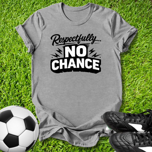 Gray t-shirt with 'Respectfully... No Chance' text on grass with soccer ball and shoes.