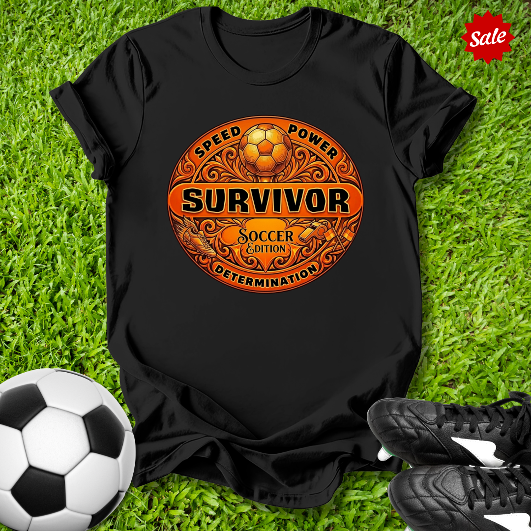 Black t-shirt with 'Survivor Soccer Edition' design on grass with soccer ball and shoes.