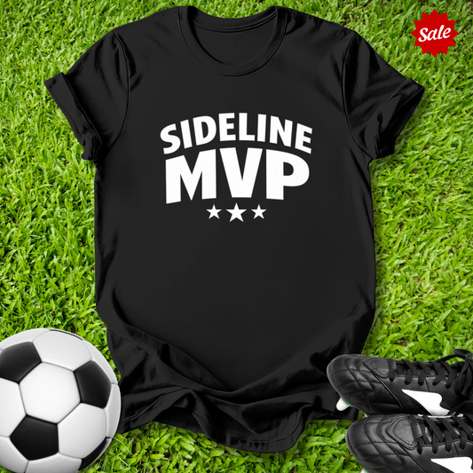 Black t-shirt with 'Sideline MVP' text on grass with soccer ball and shoes