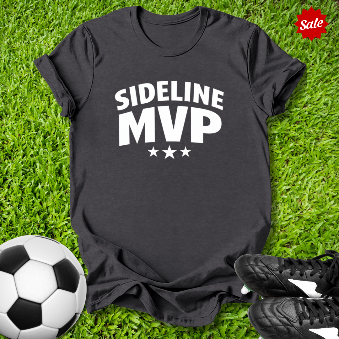 Black t-shirt with 'Sideline MVP' text on grass with soccer ball and shoes