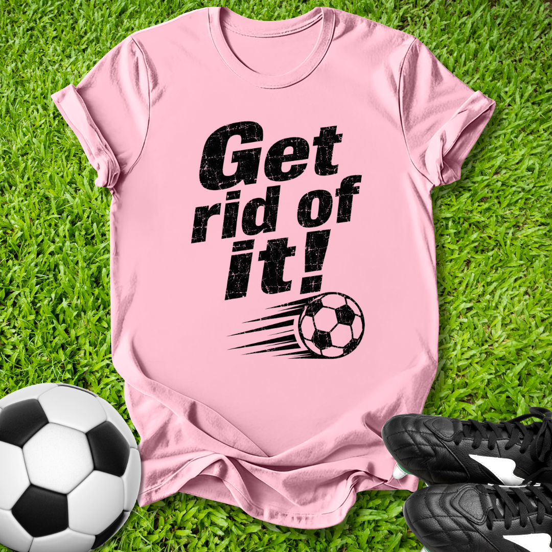 Pink t-shirt with 'Get rid of it!' text and soccer ball graphic on grass with soccer ball and shoes.