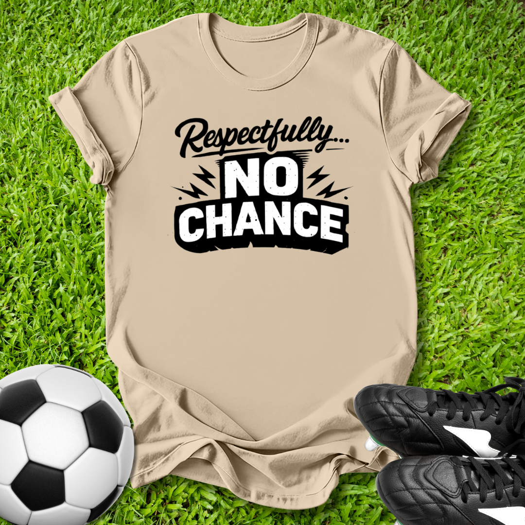 Beige t-shirt with 'Respectfully... No Chance' text on grass with soccer ball and shoes.