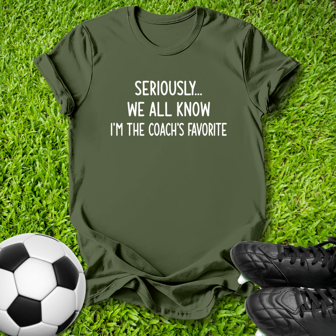 An olive green t-shirt with white text reading 'SERIOUSLY.