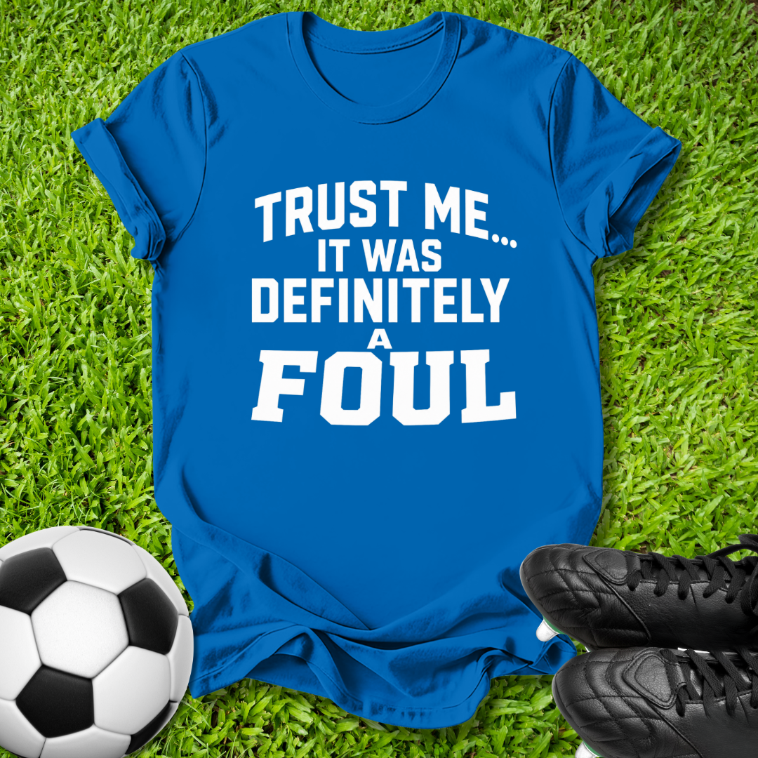 A royal blue graphic t-shirt with the text 'TRUST ME.